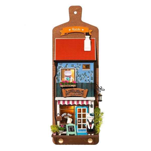 seinälle ripustettava miniatyyritalo